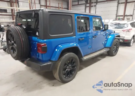 2022 Jeep Wrangler 4Xe Unlimited Sahara 4X4 z USA, uszkodzony, nr VIN 1C4JJXP65NW280491
